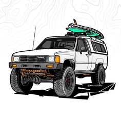 a white truck with a surfboard on top of it