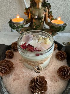 This Divine Feminine ritual / manifestation candle is infused with amethyst, rose quartz, jasmine, rose and vanilla essential oil.  All candles have been made on a working Wiccan altar and charged under a full moon.  Light this candle to assist in your manifestations or rituals.  Made with 100% organic soy wax and poured in small batches in Colorado, US.  The wax is unscented but the dried flowers & essential oils may give off a very mild aroma.  Feel free to keep the crystals and the jar to reu Divine Feminine Spell Jar, Spiritual Candles Aesthetic, Love Ritual Candle, Imbolc Ritual, Pink Candles Witchcraft, Candle Making Recipes, Wiccan Altar, Candle Crafts Diy, Intention Candles