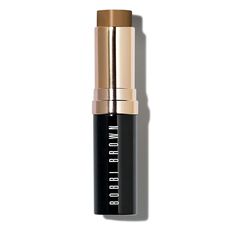 On-the-go cream foundation stick | Bobbi Brown Skin Foundation Stick, Warm Almond (W-086/6.5) - 0.31 oz/9g | After moisturizing skin, lightly glide across forehead, cheeks, nose, and chin. Blend with fingertips, a sponge, or our Foundation Brush (sold separately). Build coverage as desired. | A portable cream foundation stick that glides on weightless medium-to-full coverage that lasts all day. This versatile stick foundation effortlessly evens out your complexion and conceals imperfections with Maquillaje Glowy, Brown Skin Foundation, Cosmetic Business, Bobbi Brown Skin Foundation, Bobbie Brown, Foundation Contouring, Moisturizing Foundation, How To Match Foundation, Foundation Stick