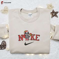 The Nike Christmas x Chibi Jack Santa Embroidered Sweatshirt is the perfect festive attire to elevate your holiday style. Featuring a charming Chibi Jack Santa embroidery, this sweatshirt combines comfort and style effortlessly. Made from high-quality materials, it ensures durability and a cozy feel. The sweatshirt’s relaxed fit allows for easy movement, making it ideal [...] Nike Cartoon, Disney Character Shirts, Georgia Southern, Disney Hoodies, Patrick Star, Halloween Hoodie, Merry Christmas Shirts, Jason Voorhees, Sports Hoodies