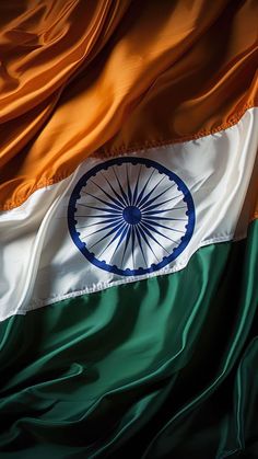 the flag of india is flying in the wind with silky fabric around it's edges