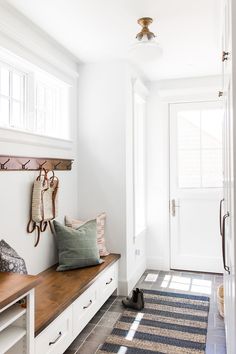 the instagram page shows an image of a room with white walls and wood floors