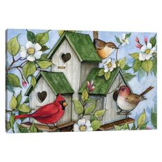 a birdhouse with birds and flowers painted on the front, surrounded by other birds