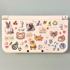 a white tray with many different stickers on it