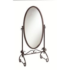 a large oval mirror sitting on top of a metal stand