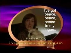 a woman holding a cat in her lap with the caption i've got peace, peace, peace in my fingers