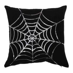 a black pillow with silver spider web on the front and back, it is made from fabric