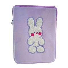 a purple bag with a white bunny on it