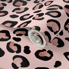 pink and black leopard print wallpaper with metallic foil on the bottom half of it