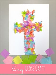 a cross made out of tissue paper with the words easy cross craft on it in front of