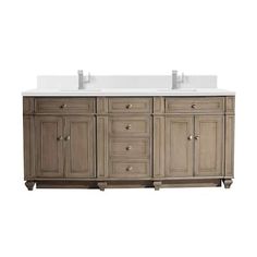 a double sink vanity with two white sinks on each side and no faucet