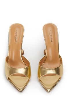 Pointed perfection, the Marcel gold leather mules are designed with a sleek and paired back shape and feature an open pointed toe-shape, a low cut rounded vamp and a chic hourglass shaped heel. With a quality luxe leather upper, lining and cushioned sole this style is not to be missed. -Material: Leather Upper & Lining -Sole: Man-Made -Fit: True to size -Toe-shape: Pointed -Features: Hourglass shaped heel -Heel: 10.5cm Metallic Kitten Heels, Gold Low Heels, Metallic Gold Shoes, Gold Kitten Heels, Gold Mules, Shop Heels, Gold Wedding Shoes, Thigh High Boots Flat, Ball Ideas