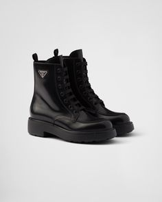 Leather lining Enameled metal triangle logo Polyester laces Boot leg: 16 cm Rubber sole, 50 mm Lug tread Leather insole Chloe 2024, Boots Prada, Heel Boots For Women, Platform Combat Boots, Airport Fashion, Block Heel Boots, Black Chelsea Boots, Leather Boots Women, Leather Chelsea Boots