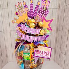 a birthday gift basket filled with candy and candies