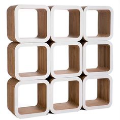 a white and brown shelf with six cubes on each side, in front of a white background