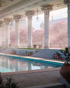 an outdoor swimming pool with steps leading to it and flowers in pots on either side