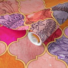 an artistically designed wallpaper with pink, purple and orange designs on it's surface