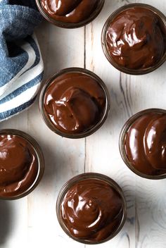 chocolate pudding in small glass jars with text overlay that says best homemade chocolate pudding