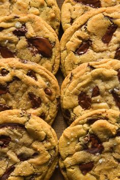 chocolate chip cookies are stacked on top of each other