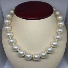 16 Mm White Matt Mother Of Pearl Necklace. 15 Mm Sterling Silver With Cubic Zirconia Ball Clasp. Hand Knotted Between Each Pearl. 17.5” Of Length White Classic Necklaces For Party, Classic White Necklaces For Party, Classic White Necklace For Party, Formal White Round Bead Necklaces, Big Pearl Necklace, Big Pearl, Silver Necklace Statement, Mother Of Pearl Necklace, Pearl Necklaces