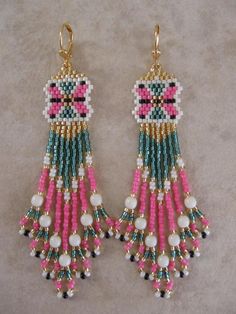 two pairs of beaded earrings with black, pink and green beads hanging from them