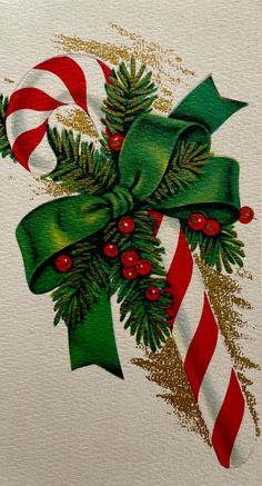 a christmas card with candy canes, holly and candies on it's side