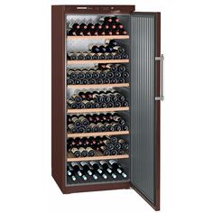 the wine cooler is full of many bottles