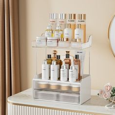 a shelf with many different types of skin care products on it next to a mirror