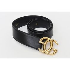 This 1980's Gucci black leather logo wide vintage belt is Italian and has the large gold plated GG's. It says 100/40 on the inside back. The GG's measure 2.5" W x 2.5" H as they are intertwined. The black belt strap is 44" L or wide x 1.85" H or deep. With the GG's logo included the entire belt width is 46.25" W or long. Says Made in Italy by Gucci. There are 3 original belt holes. Luxury Black Belt Buckles With Gold-tone Hardware, Black Belt Buckles With Gold-tone Hardware For Business, Luxury Black Belt Buckle With Gold-tone Logo Plaque, Designer Black Belt With Gold-tone Logo Plaque, Formal Black Belt Buckles With Gold-tone Logo, Designer Black Belts With Gold-tone Logo Plaque, Elegant Black Belt Buckle With Gold-tone Logo, Gucci Designer Belt Buckles For Business, Chic Black Belt With Gold-tone Logo Plaque