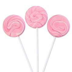 three pink lollipops sitting on top of each other