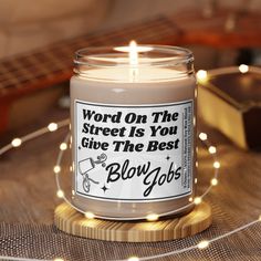 a candle that reads word on the street is you give the best blvdjogs