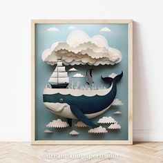 a paper cut whale with a boat in the ocean and clouds above it on a blue background