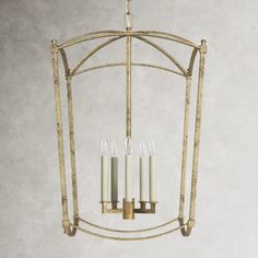 a chandelier with four candles hanging from it