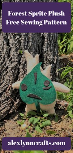 a stuffed animal sitting next to a tree with text overlay reading forest sprite plush free sewing pattern