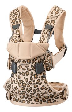 a baby carrier with leopard print on it