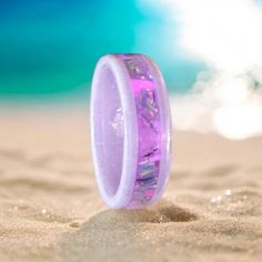 Unicorn Women's Ring - A Magical Fusion of Purple Ceramic, Pink Glow, Bello Opals & Herkimer Quartz ✨ Embrace the Magic ✨ Step into a world of enchantment with our "Unicorn" women's ring, where the mystical meets the modern. This exquisite piece is designed for those who believe in the beauty of the extraordinary. Features: Purple Ceramic Core: A smooth, durable base that radiates a sense of calm and serenity. Pink Glow Powder: Adds a mesmerizing glow, making the ring shimmer even in low light, capturing the essence of ethereal beauty. Bello Opals: Embedded within the band, these stunning opals reflect a spectrum of colors, reminiscent of a unicorn's magical aura. Herkimer Quartz: Known for its clarity and brilliance, this genuine quartz adds a touch of sparkle, elevating the ring's overal Glow Ring, Unicorn Ring, Purple Ceramic, Princess Toys, Rochester Ny, Shorts Women, Ethereal Beauty, Denim Shorts Women, Low Light