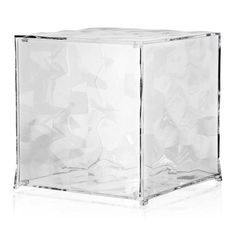 a clear cube shaped object on a white background