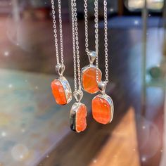 Chain Length: Adjustable 16" or 18" Gemstone Size: .25-.38" Long x .25" Wide KEY WORDS: Ambition, Energy, Action Carnelian embodies the fiery nature of our being; the passion, motivation, and desire we often stifle. This stone ignites the hearth of your soul, also known as the solar plexus, to create sparks of curiosity and ambition. It also opens the root chakra, backing up inspiration with the physical energy to pursue it. Beyond passions, Carnelian overall brings life force energy into the bo Luxury Orange Spiritual Necklaces, Amber Sterling Silver Necklace For Healing, Orange Pendant Necklace With Birthstone, Orange Birthstone Pendant Necklace, Orange Spiritual Necklace For Gift, Everyday Spiritual Orange Jewelry, Spiritual Carnelian Gemstone Crystal Necklace, Spiritual Carnelian Crystal Necklace, Adjustable Carnelian Crystal Necklace Gift