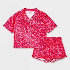 Your kid will hit the hay in cute style with this 2-Piece Short-Sleeve Coat Pajama Set from art class™. This set includes a sleep shirt and shorts, both crafted from recycled polyester knitted fabric for comfortable wear. The short-sleeve button-down shirt features a classic notched collar with a chest patch pocket, while the ruffled hem shorts have a full elastic waistband for a snug fit. Mix and match the set with other PJ separates for a variety of looks. art class™: One-of-a-kind looks for t Short Sleeve Coat, Button Up Pajamas, Flannel Pants, Satin Short, Shirt And Shorts, Print Coat, Cute Style, Fabric Tape, Sleep Shirt