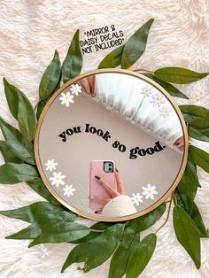 a person taking a selfie in a mirror with the words you look so good on it