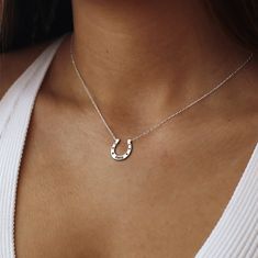 "Elegant Western-Style Horseshoe Necklace for Horse Lovers, Minimalist Western Horseshoe Charm for Good Luck, Horsehoe necklace, Gift Rider Welcome to my shop, All our produtcs handmade with love. Handmade silver necklace is a very nice and dainty gift that you can buy for your loved ones or yourself.  We are happy to create a design on the necklace with your name or special names for you.  ♡ Materials: High Quality 925 Sterling Silver, 14K Gold Plated Silver and 14K Rose Gold Plated Silver ♡ All necklaces will be carefully packaged and sent in a special gift box. I hope you can find your personalized necklace that suits you in our store. For other samples, please visit our store. ♡ HOW TO ORDER ♡ 1- Select a colour  2- Choose necklace length ( Standard 16\" and for kids 12\" ) 3- Please w Horseshoe Necklace Silver, Necklaces Western, Horse Shoe Necklace, Silver Horseshoe Necklace, Minimalist Western, Equestrian Necklace, Western Gifts, Western Necklaces, Horseshoe Necklace