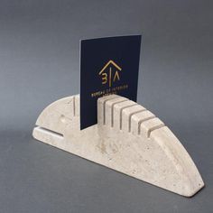 a business card holder made out of marble