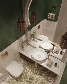 a bathroom with green walls and two sinks in the middle, surrounded by toiletries