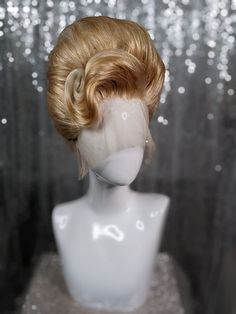 A fully styled synthetic lacefront wig. This style is an elegant 1960s beehive updo style with a front swoop. Colours pictured: Vanilla Caramel, Platinum Blonde Please note: all wigs are made to order, these wigs are for illustrative purposes only. Beehive Updo, Beehive Wig, Updo Wig, Vintage Wigs, Drag Queen Wigs, Lacefront Wig, High Fashion Hair, Drag Wigs, Vanilla Caramel