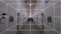 an image of a hallway with white lines going through the center and two doors on each side