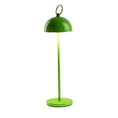 a green table lamp on a white background