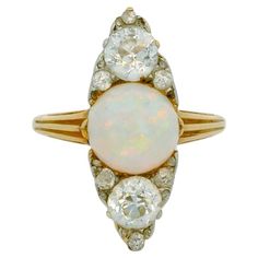 Victorian Navette ring circa 1890- 1900. The ring si set with a beautiful opal, 2 main old European cut diamonds for a total of approximately 1.30 Carats and 6 small old European cut diamonds. Color of the diamonds: Estimated H/I Clarity of the diamonds: Vs/Si clarity The ring is resizable. The ring is very high quality, you can see it through the side and the back of the ring. Length of the ring: 2.7 cm Navette Ring, Rosecut Diamond Ring, Vintage Style Rings, Vintage Diamond Rings, Victorian Rings, European Cut Diamonds, 14k Gold Ring, Rose Cut Diamond, How To Make Earrings