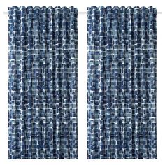 two blue curtains with small squares on them