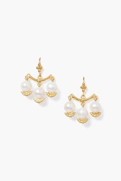 These gold chandelier earrings featuring a trio of white pearl add an opulent touch to any look.18k gold plated sterling silver, white freshwater pearl.1 1/8" drop.Handmade in Vietnam.