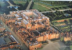 an aerial view of a large brick building